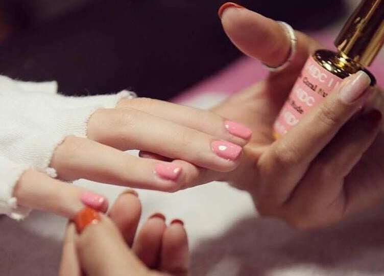 Pink manicure at Eden of Ashburn Salon and Spa, Ashburn, Virginia, US, showcasing precision nail care.