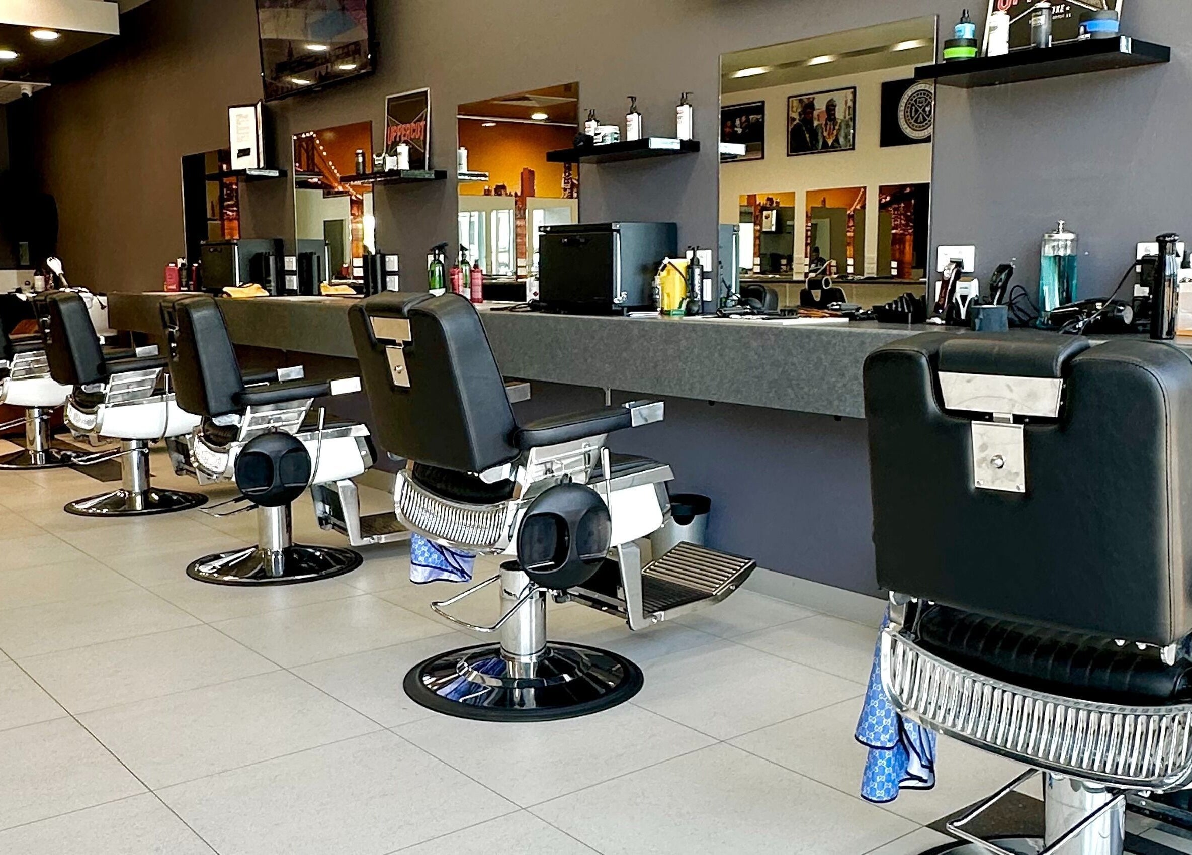 Modern barber chairs in Goats Cuts, Southport, Queensland, AU with sleek design and comfortable seating.