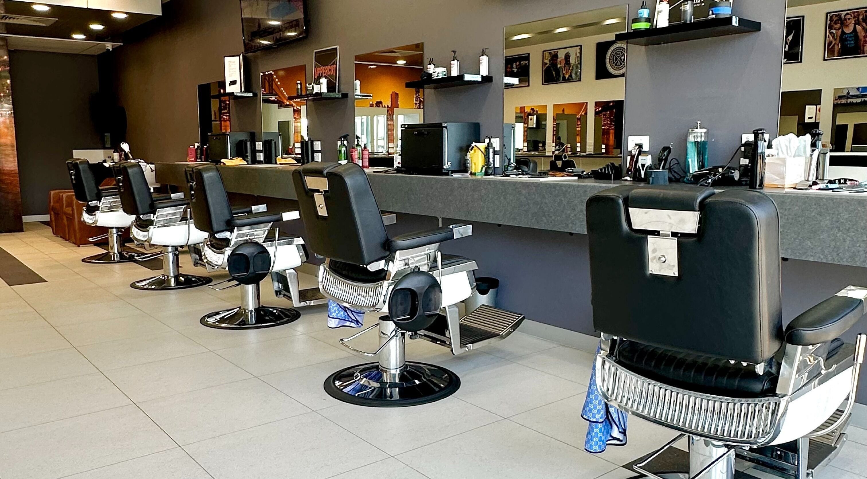 Modern barber chairs in Goats Cuts, Southport, Queensland, AU with sleek design and comfortable seating.