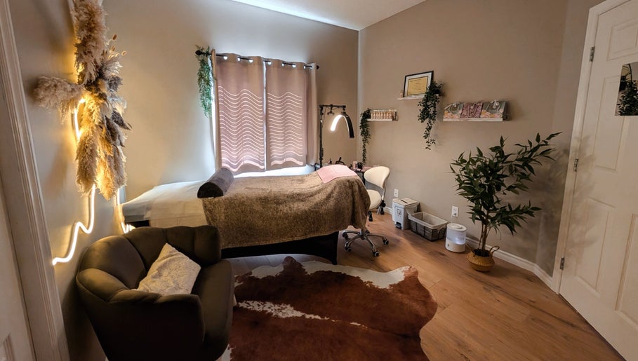 Relaxing treatment room at Country Lashes in Warburg, Alberta, CA with cozy decor and soft lighting.