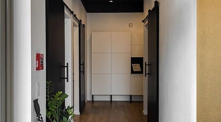 Modern corridor with plants at Esthetic Society, Bellevue, Washington, US.