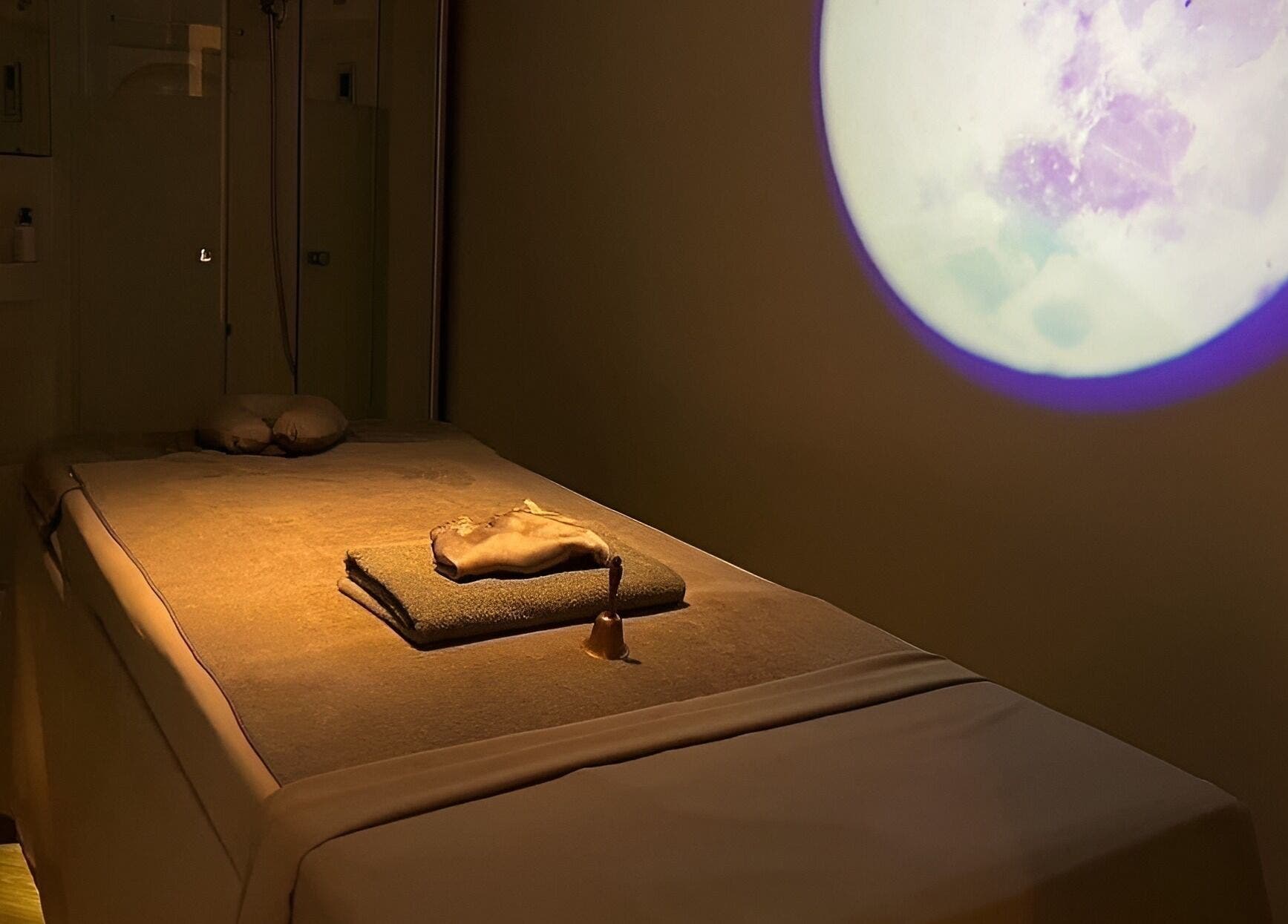 Tranquil massage room at XINGSPA, กรุงเทพมหานคร, กรุงเทพมหานคร, TH with calming ambiance.