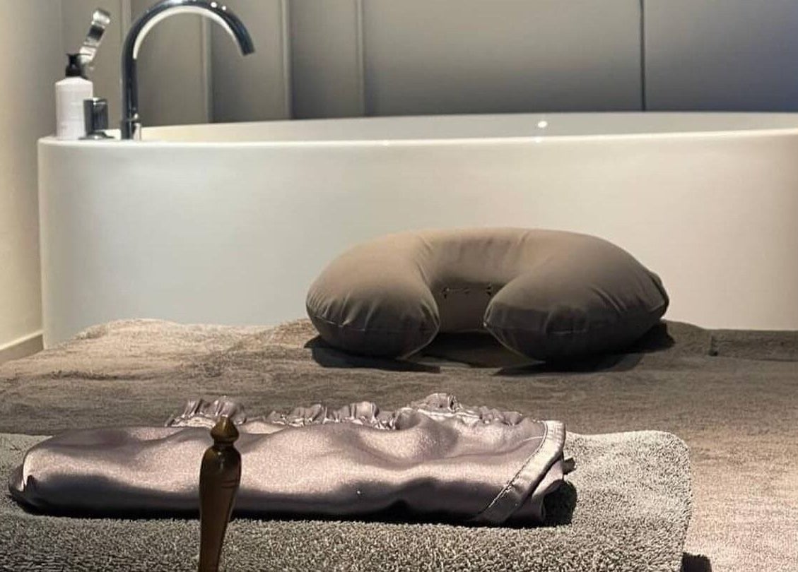 Relaxing spa setup at XINGSPA with comfortable pillows and plush towels, กรุงเทพมหานคร, TH.