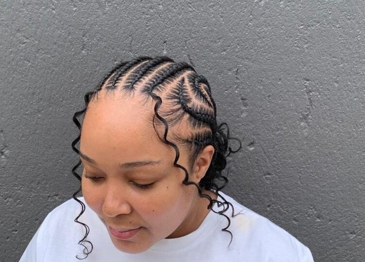 Stylish braided hairstyle at Queens Studio SA, Fourways, Gauteng, ZA. Showcasing detailed protective braids.