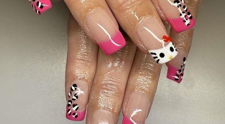 Stylish pink nail art with Hello Kitty design at Sweet&SinfulBeauty, Tamworth, New South Wales, AU.