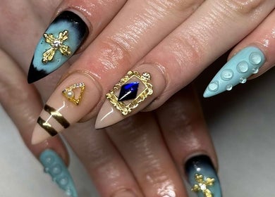 Intricate nail art at Sweet&SinfulBeauty, Tamworth, New South Wales, AU, showcasing stylish designs.