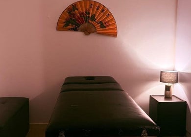 Tranquil massage room at Statera Massage Studio, Cape Town, Western Cape, ZA with soft lighting and decor.