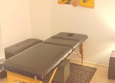 Massage table at Statera Massage Studio in Cape Town, Western Cape, ZA, creating a serene and calming environment.