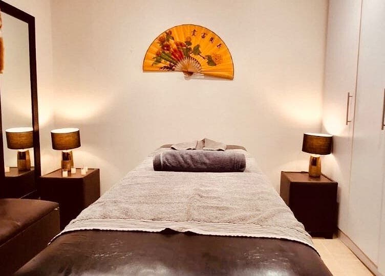 Calming massage room at Statera Massage Studio, Cape Town, Western Cape, ZA. Cozy ambiance and tranquil setting.