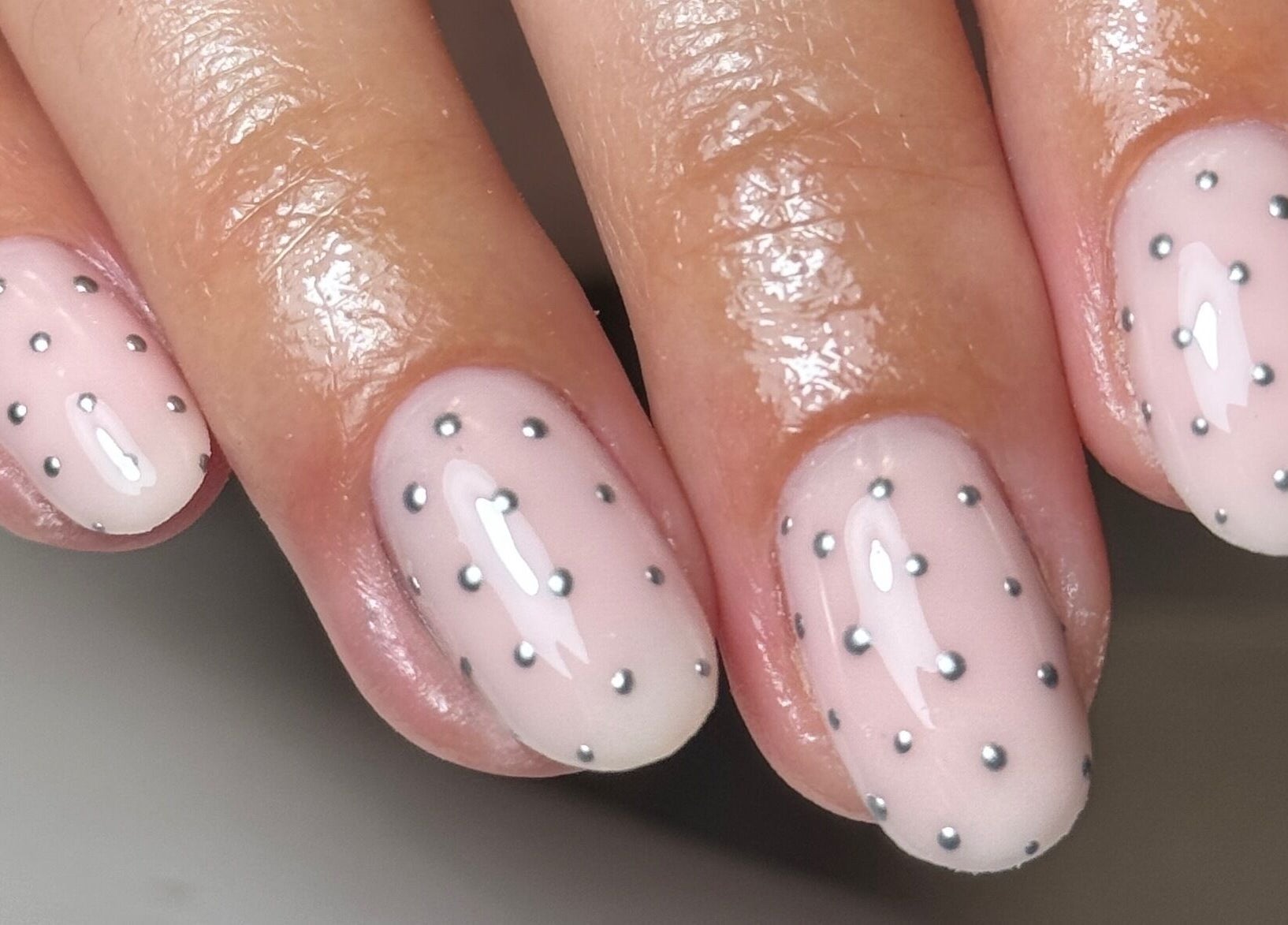 Elegant polka dot nail art by Ameliaelizabethnails in Stoke-on-Trent, England, GB.