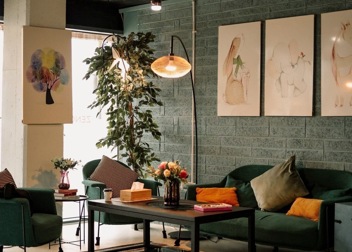 Relax in the cozy lounge at Zencora, Drogheda, County Louth, IE with plush seating and artistic decor.