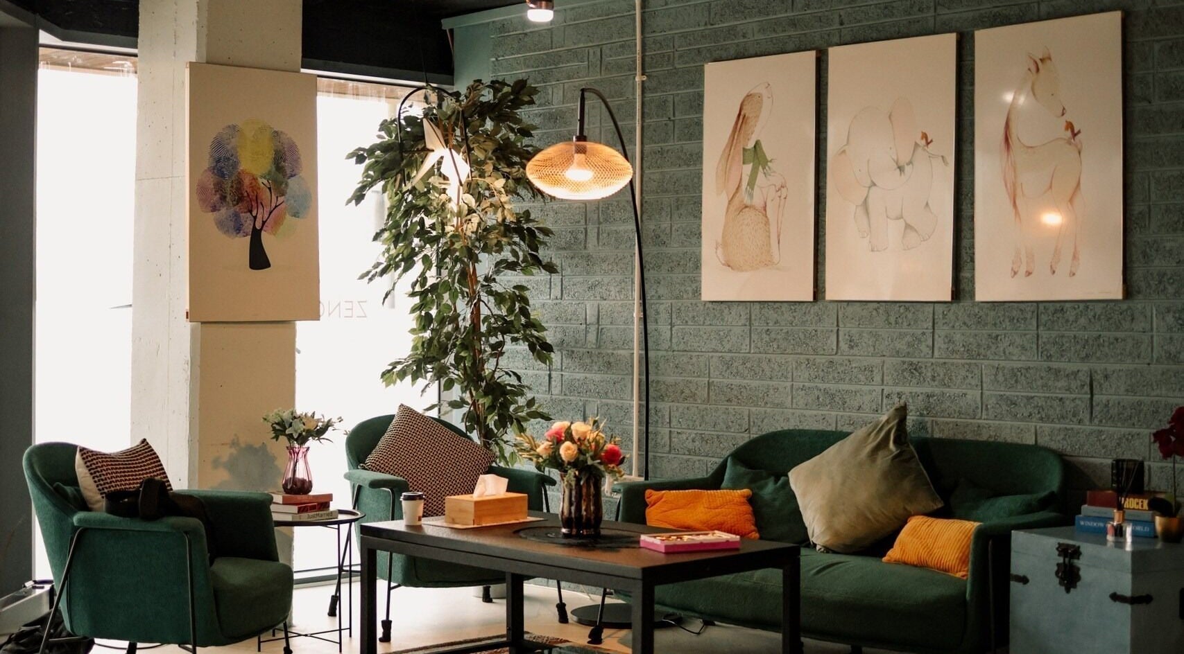 Relax in the cozy lounge at Zencora, Drogheda, County Louth, IE with plush seating and artistic decor.