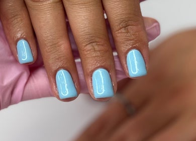 Azure blue nails at Beauty by Billie in Portsmouth, England, GB, showcasing expert manicure work.