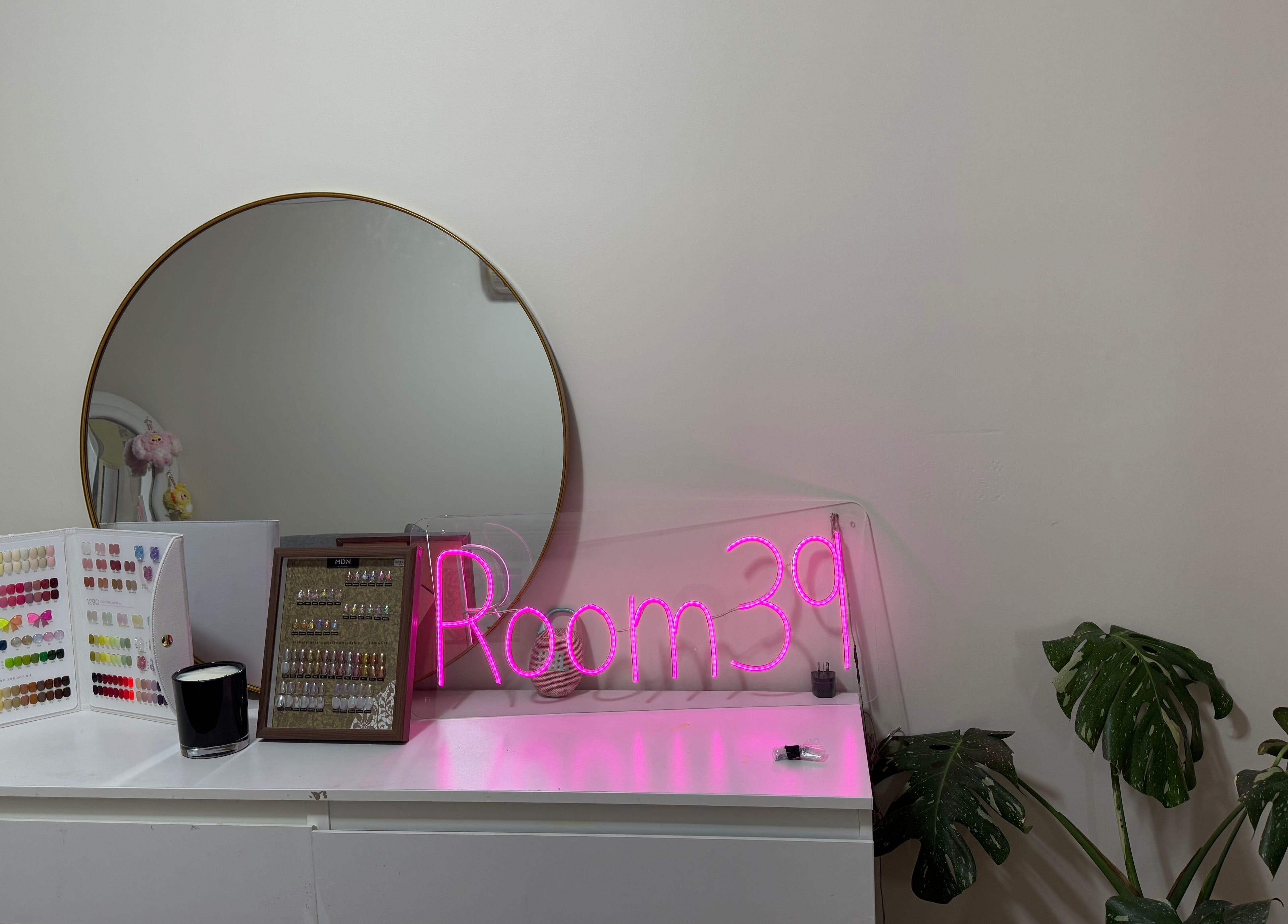 Nails.Room39 nail color samples and neon sign in Green Valley, New South Wales, AU.