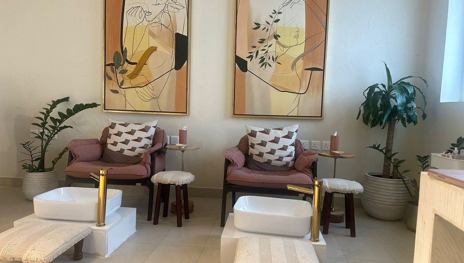 Elegant spa pedicure chairs and art at أسدان سبا ASADAN spa, Riyadh, Riyadh Province, SA.