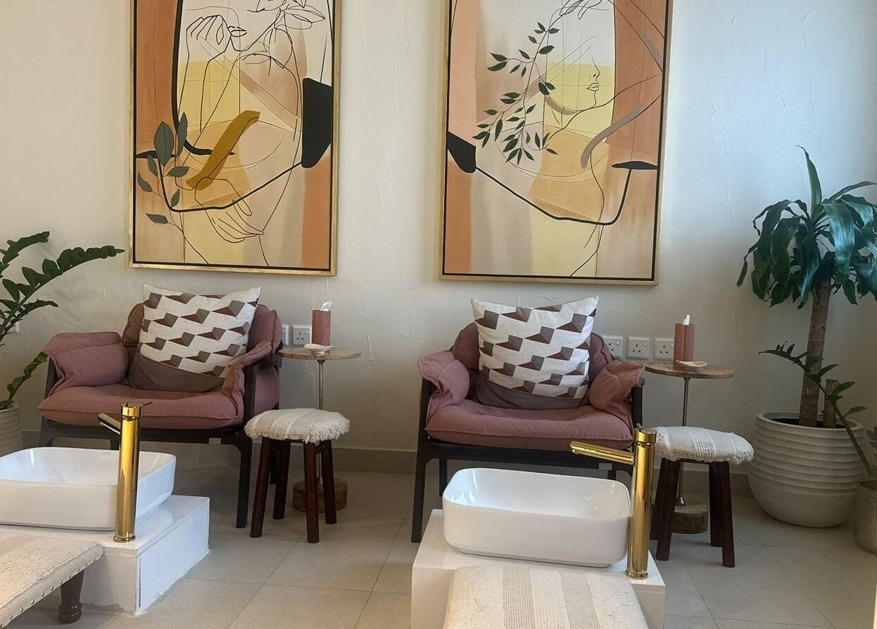 Elegant spa pedicure chairs and art at أسدان سبا ASADAN spa, Riyadh, Riyadh Province, SA.