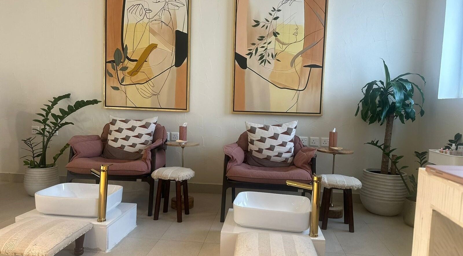 Elegant spa pedicure chairs and art at أسدان سبا ASADAN spa, Riyadh, Riyadh Province, SA.