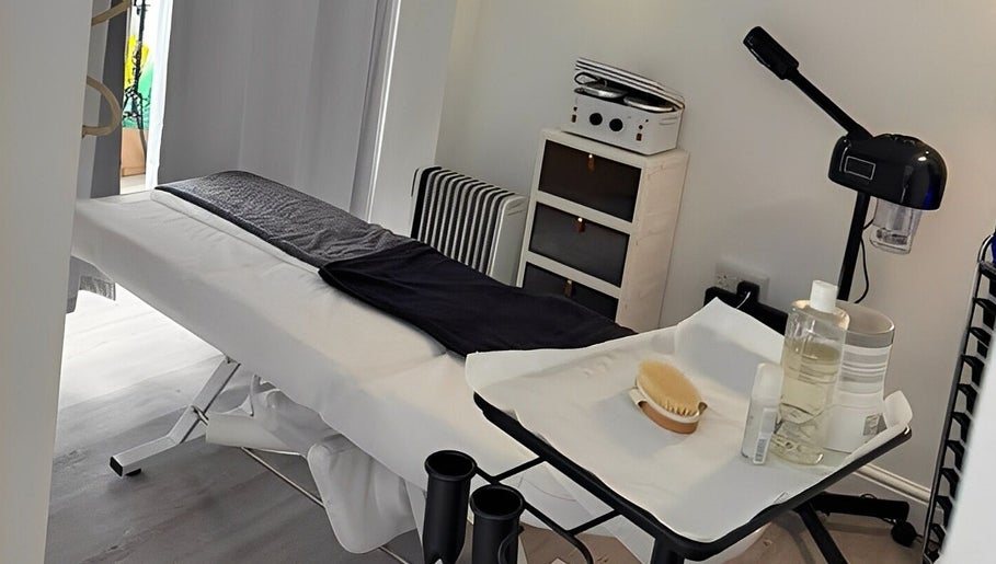 Massage room at Above & Beyond Beauty & Massage, Sutton-in-Ashfield, England, GB. Features treatment table and spa essentials.