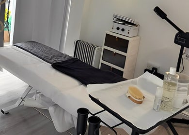 Massage room at Above & Beyond Beauty & Massage, Sutton-in-Ashfield, England, GB. Features treatment table and spa essentials.