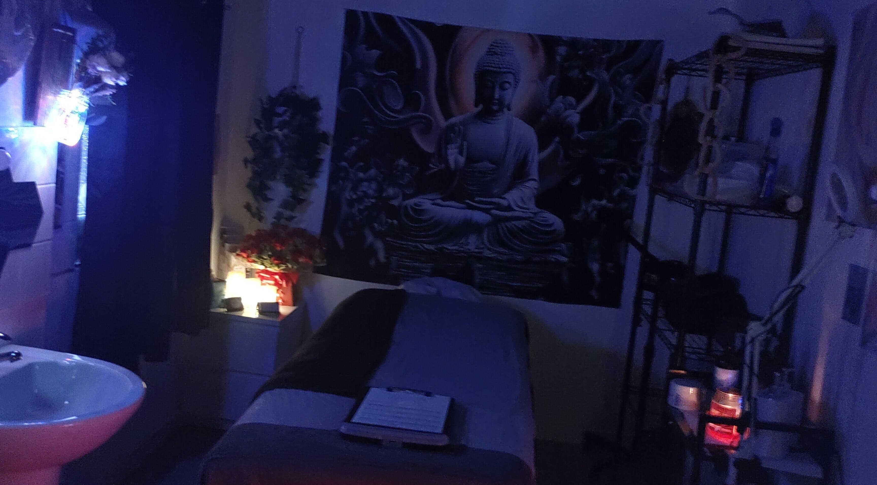Tranquil massage room at Above & Beyond Beauty & Massage, Sutton-in-Ashfield, England, with peaceful decor.