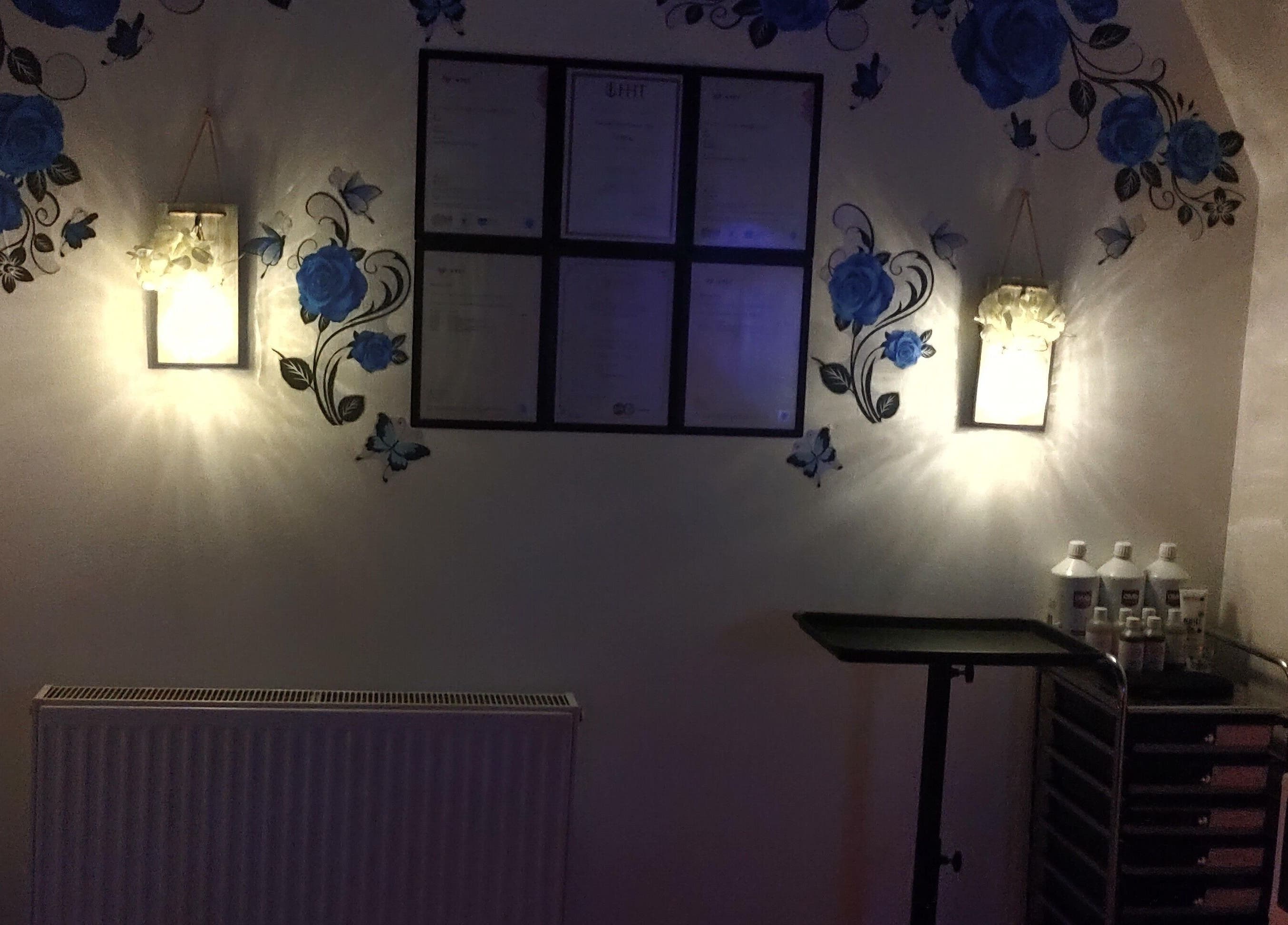 Ambient room at Above & Beyond Beauty & Massage, Sutton-in-Ashfield, England, with soft lighting and decor.