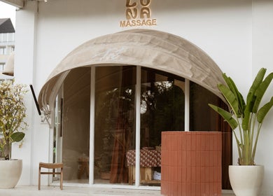 Elegant entrance of Luna massage bali - Pererenan, Bali, ID, featuring potted plants and a welcoming awning.