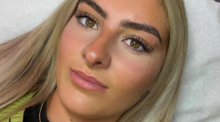 Client with beautifully enhanced lashes at Bourne2lash, Brynhyfryd, Wales, GB. Showcasing expert beauty services.