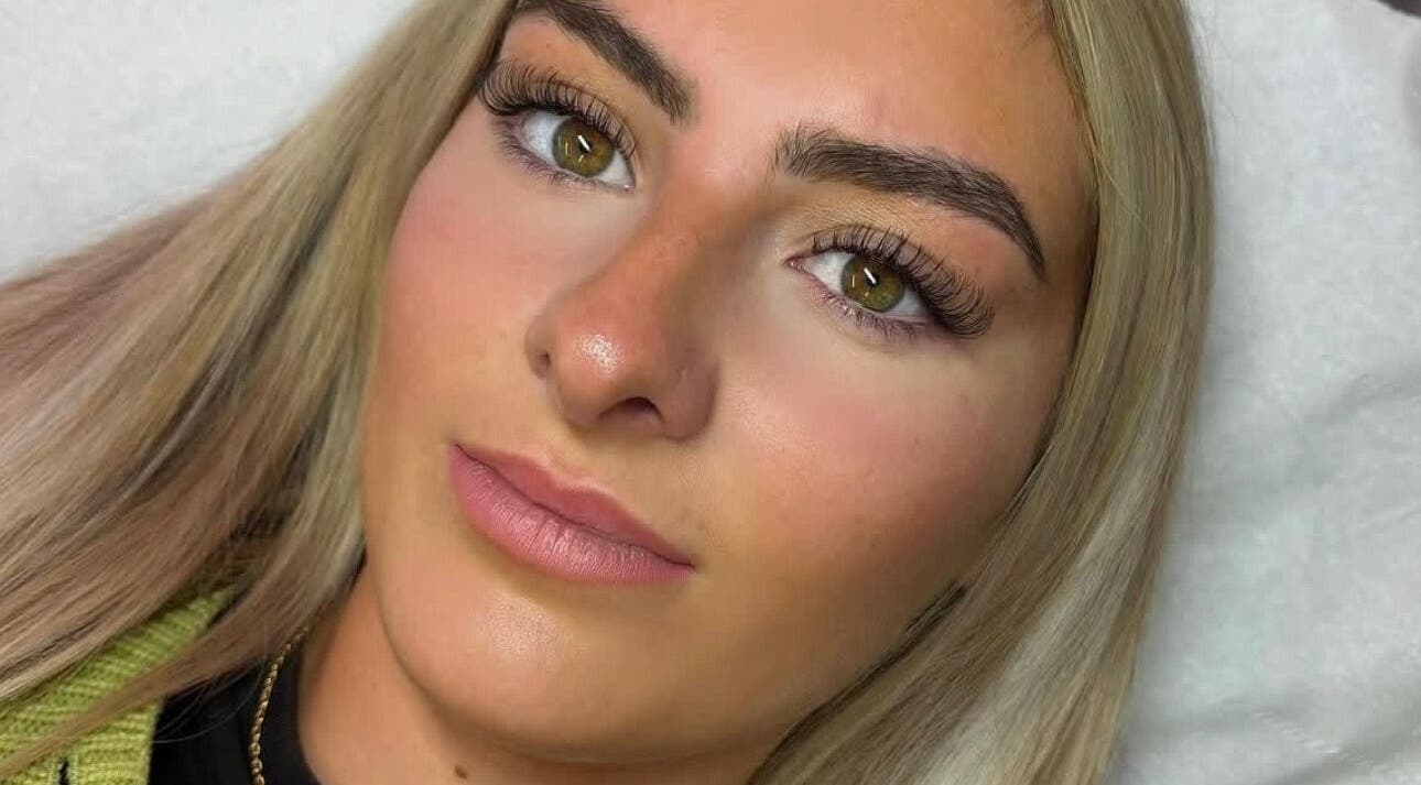 Client with beautifully enhanced lashes at Bourne2lash, Brynhyfryd, Wales, GB. Showcasing expert beauty services.