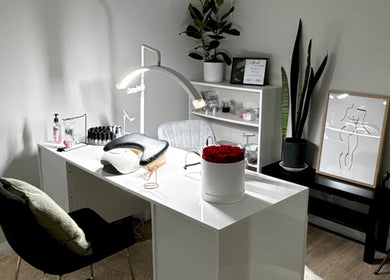 Modern nail station at Monca Nail Bar in Belmont, Western Australia, AU. Elegant decor with plants and art.