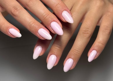 Beautifully manicured hands at Monca Nail Bar, Belmont, Western Australia, AU showcasing elegant pale pink nails.