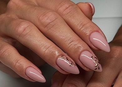 Stylish pink manicure at Monca Nail Bar, Belmont, Western Australia, AU with gold accents.