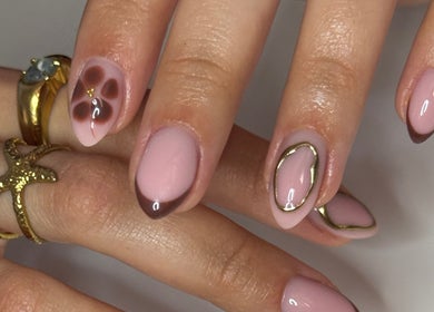 Stylish nail art with gold accents at Monca Nail Bar, Belmont, Western Australia, AU.