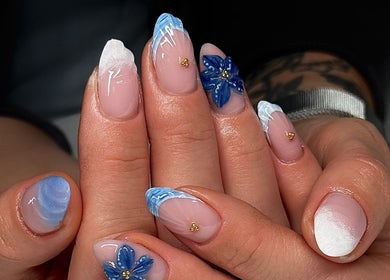 Intricate blue floral nail art at Monca Nail Bar, Belmont, Western Australia, AU showcasing expert design.