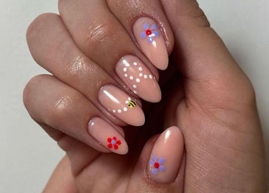 Elegant nail art with floral design at Sinéad H Beauty, Great Oakley, England, GB.