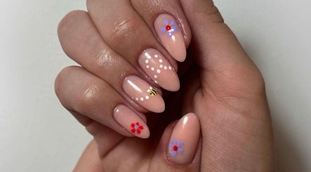 Elegant nail art with floral design at Sinéad H Beauty, Great Oakley, England, GB.