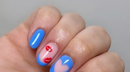 Stylish blue and pink nail art at Sinéad H Beauty, Great Oakley, England, GB.
