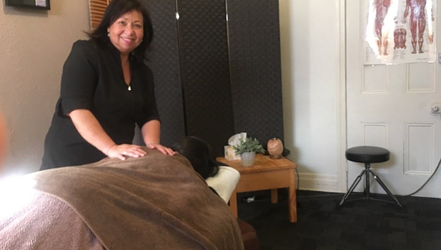 Massage therapist at Body Tunes Remedial Massage in Lancefield, Victoria, AU providing a soothing massage.