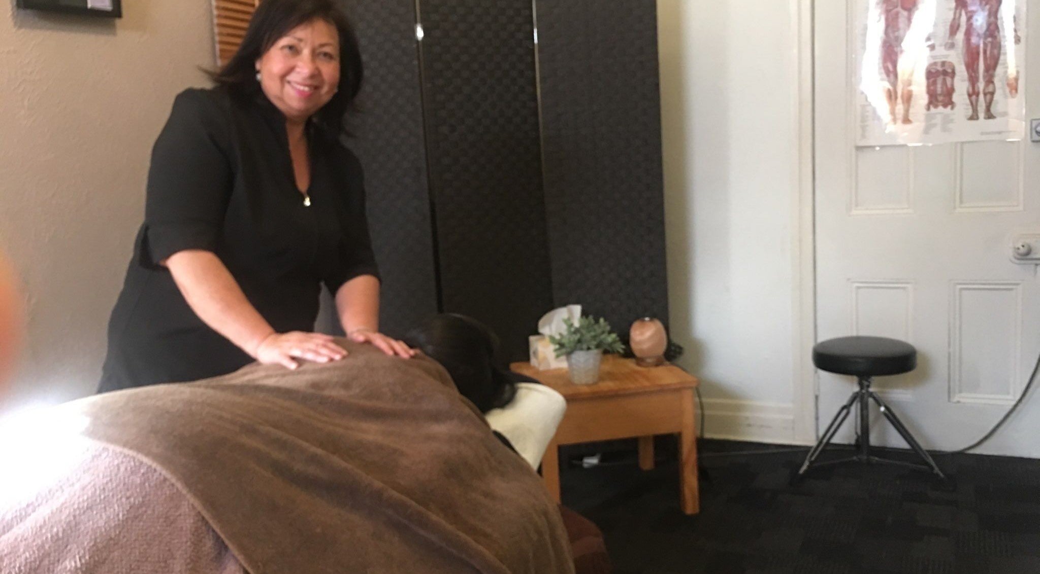 Massage therapist at Body Tunes Remedial Massage in Lancefield, Victoria, AU providing a soothing massage.