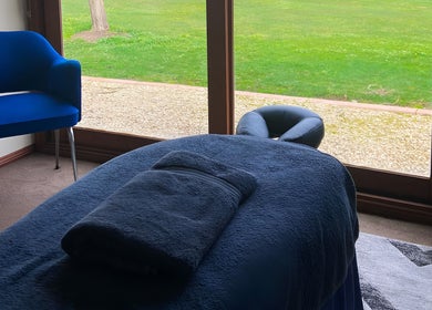 Cozy massage room with window view at Body Tunes Remedial Massage, Lancefield, Victoria, AU.