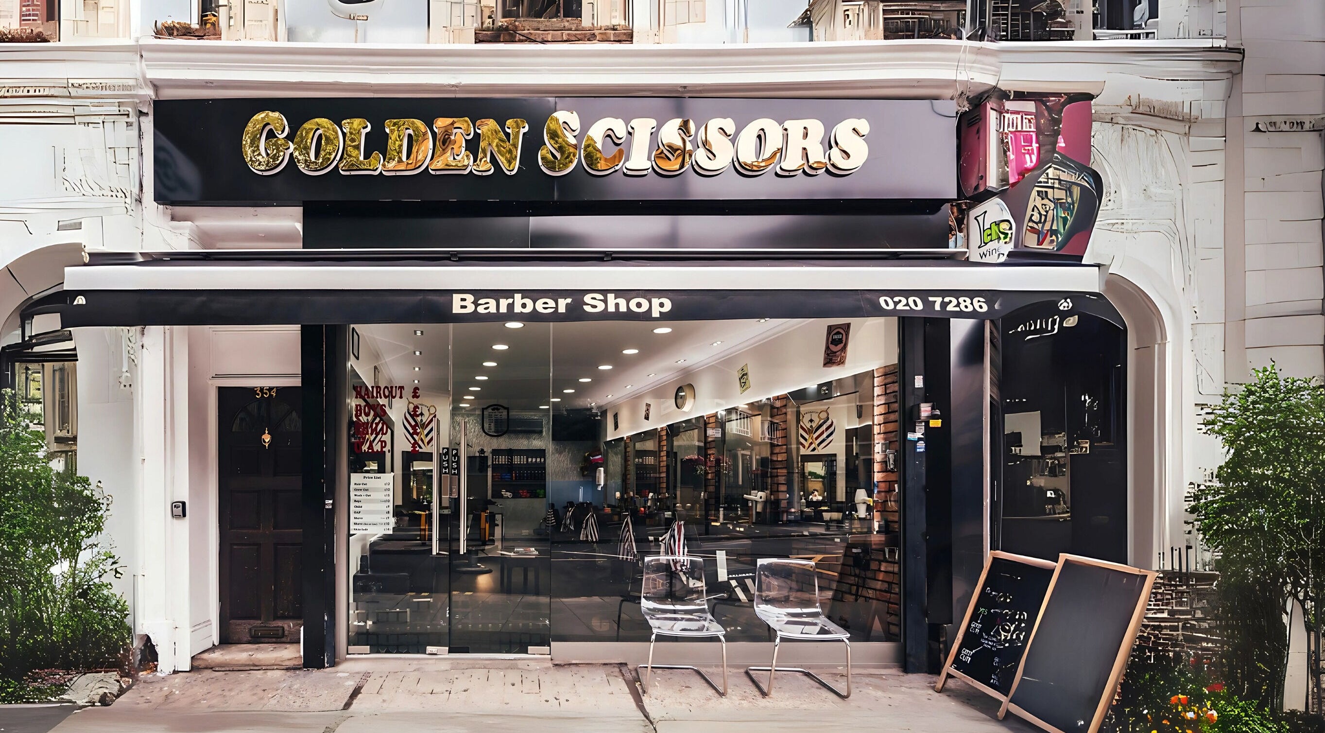 Front view of GOLDEN SCISSORS barber shop in London, England, GB with elegant signage and glass facade.