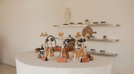 Essential oils displayed in elegant bottles at Aetheria Natural Healing Spa, Canggu, Bali, ID.