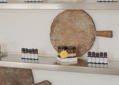Aetheria Natural Healing Spa's shelves with oils and jars, Canggu, Bali, ID.