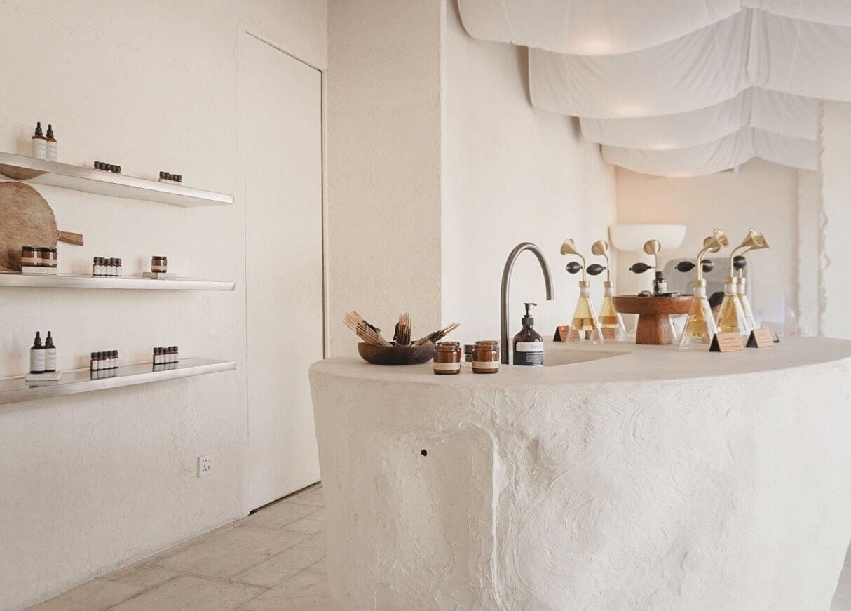 Interior of Aetheria Natural Healing Spa in Canggu, Bali, ID, showcasing natural decor and wellness products.