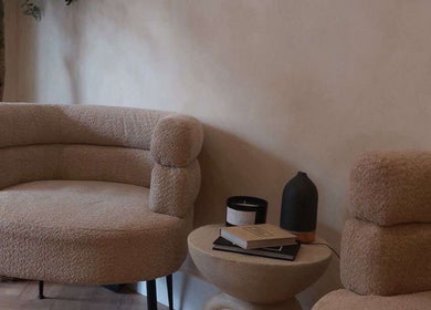 Elegant seating area at Beauty by Amy Rignall in Royal Leamington Spa, England, GB, featuring plush chairs.