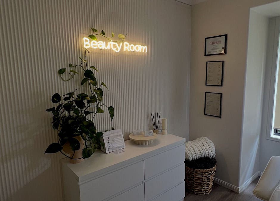 Elegant beauty room at Jorjayarkerbeauty, Coomera, Queensland, AU with neon sign and soothing decor.