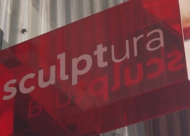 Red Sculptura sign for Anti-Cellulite & Body Sculpting, Bali, Bali, ID, welcoming visitors.
