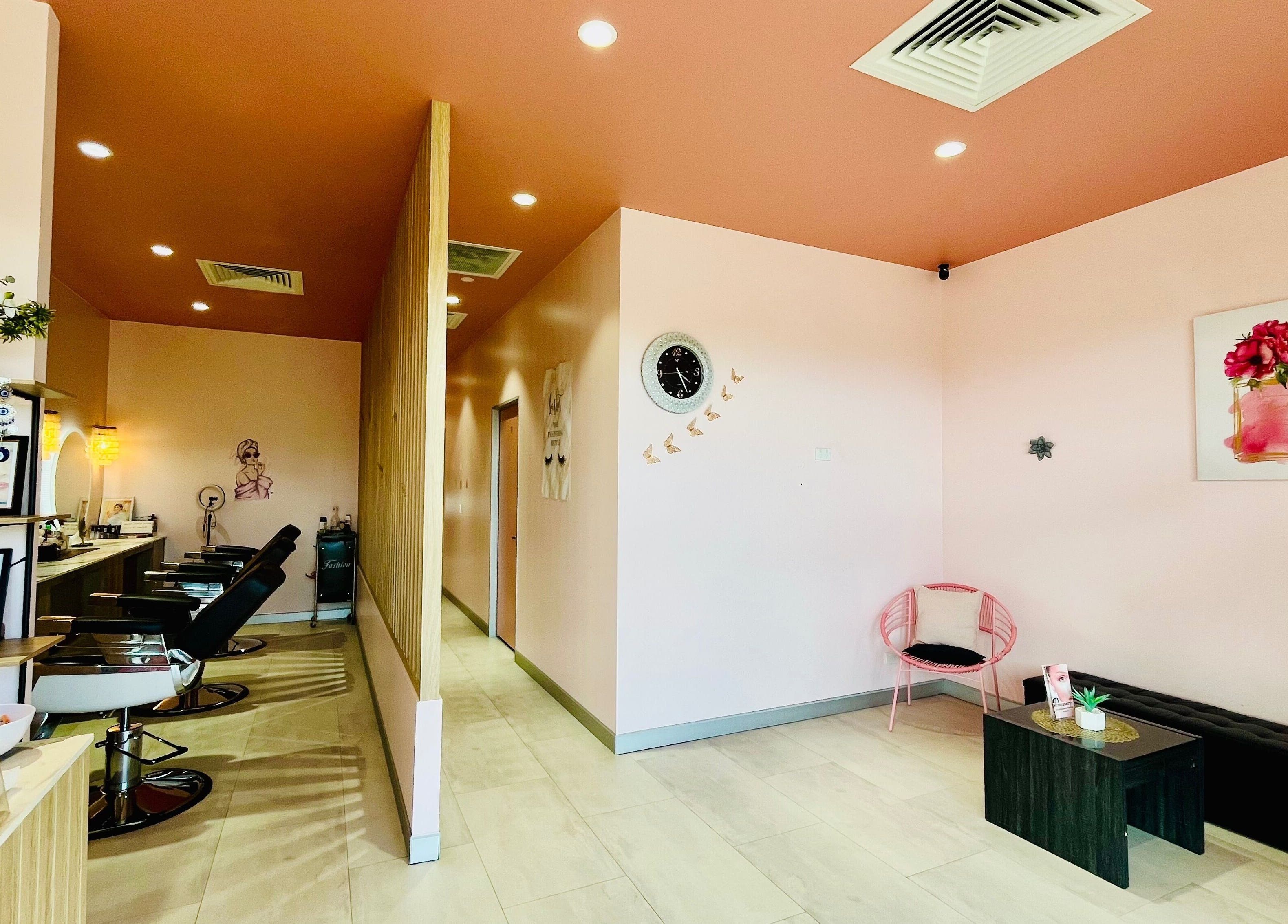 Interior of Sargis Beauty Stop in Greenbank, Queensland, AU, showcasing stylish salon chairs and decor.