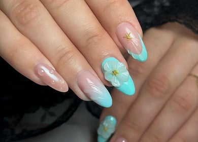 Blue floral nail art by Nailsby.Jona, Coventry, England, GB showcases intricate design and creativity.