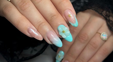 Blue floral nail art by Nailsby.Jona, Coventry, England, GB showcases intricate design and creativity.