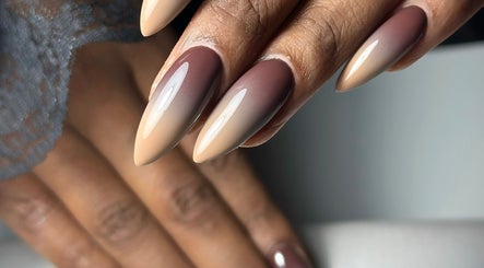 Stylish ombre nails at Nailsby.Jona in Coventry, England, GB, showcasing sleek and chic nail art design.